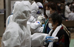 radiation contamination screening, 03-15-11 
(AP Photo/Wally Santana)