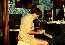 playing piano at 33 Carmel