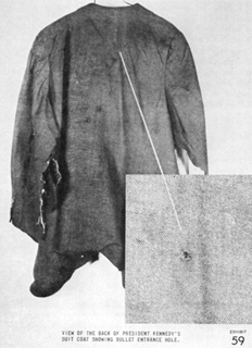 bullet hole in JFK's jacket and shirt